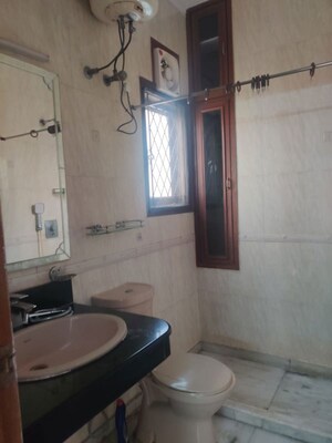 Bathroom in 4 BHK Builder Floor at Green Park – for Rent