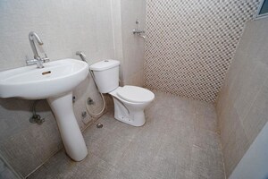Bathroom in 2 BHK Apartment at Aditya City Apartments, Shahpur Bamheta – for Sale