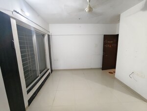 Living Room in 2 BHK Apartment at Mantra Ira, Undri – for Rent