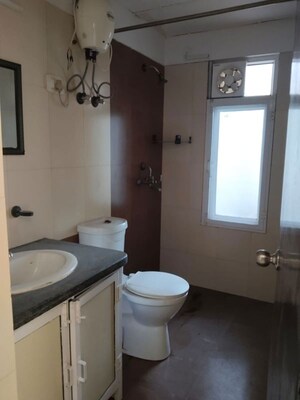 Bathroom in 3.5 BHK Apartment at Mahagun Moderne, Sector 78 – for Rent