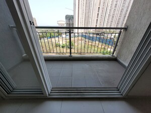 Balcony in 3 BHK Apartment at Godrej Emerald, Ghodbunder Road – for Rent