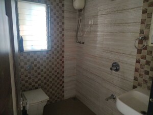Bathroom in 3 BHK Apartment at Shanti Green Palms, Ghansoli – for Sale