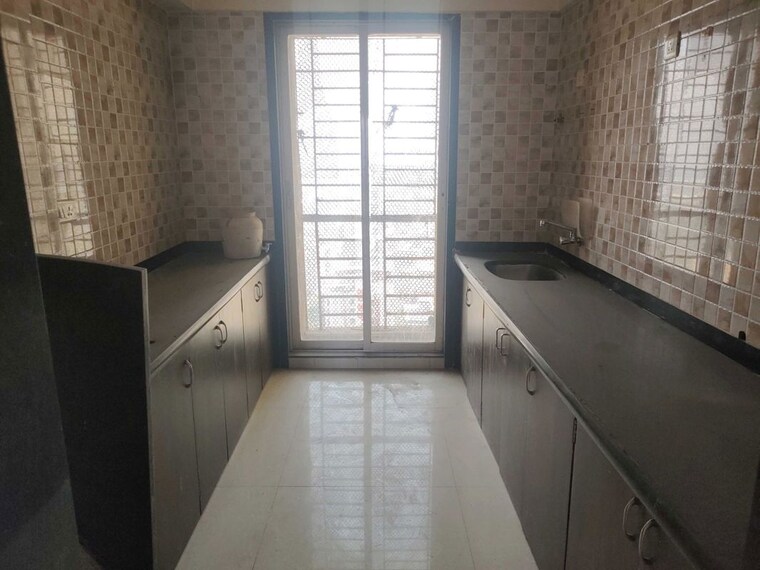 Kitchen, shanti-green-palms 3 Bedroom 1000 Sq.Ft. Apartment In Ghansoli Navi Mumbai 10565115