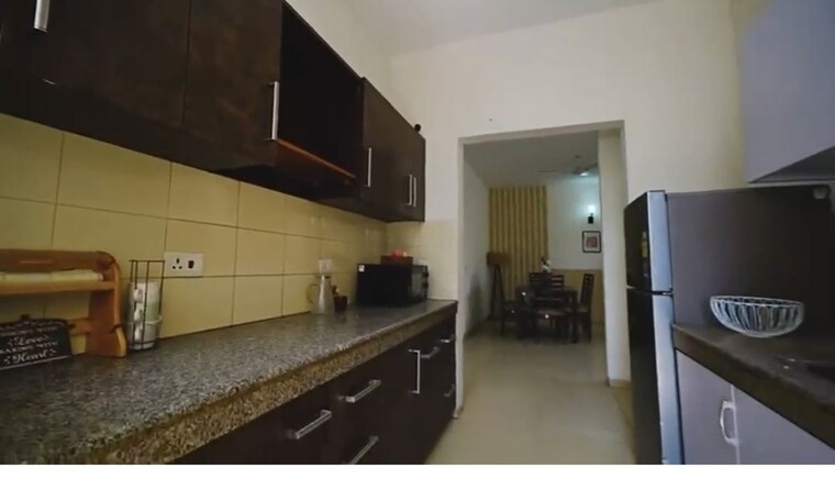 Kitchen, vatika-gurgaon-21 3 Bedroom 1735 Sq.Ft. Apartment In Sector 83 Gurgaon 10565129