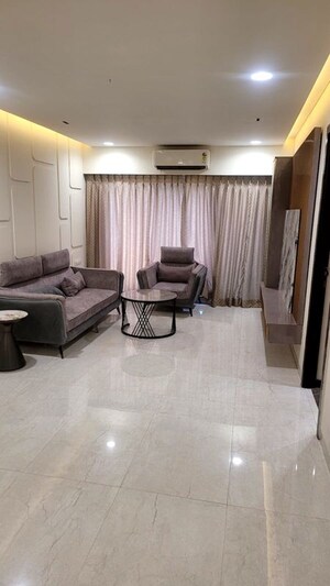 Living Room in 1 BHK Apartment at Dream Arihant Niwara Sky, Sion – for Sale