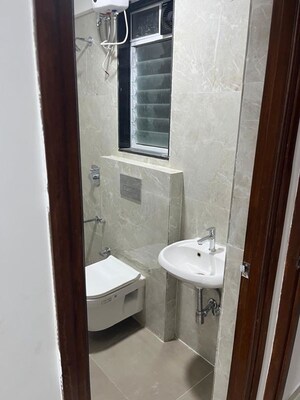 Bathroom in 3 BHK Apartment at Infinity Paradise CHS, Goregaon West – for Rent