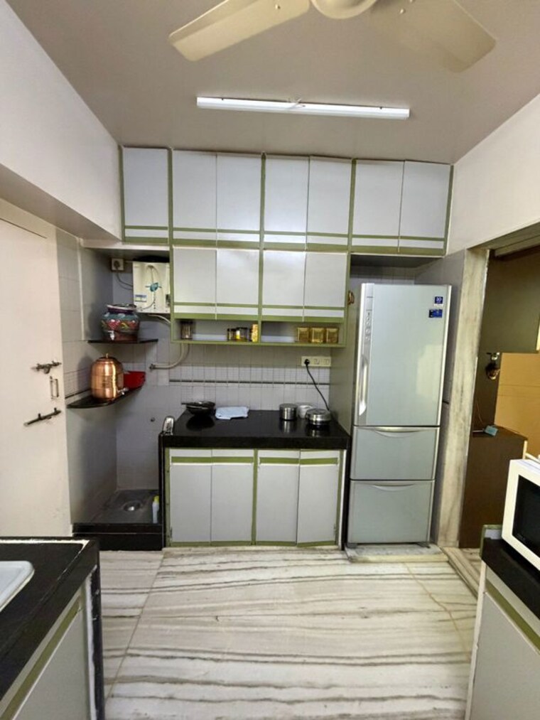 Kitchen, nirvan-apartment 2.5 Bedroom 1000 Sq.Ft. Apartment In Khar West Mumbai 10565199