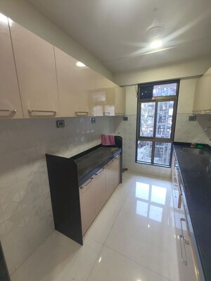 Kitchen in 2 BHK Apartment at Shiv Shakti Tower 28, Malad East – for Rent
