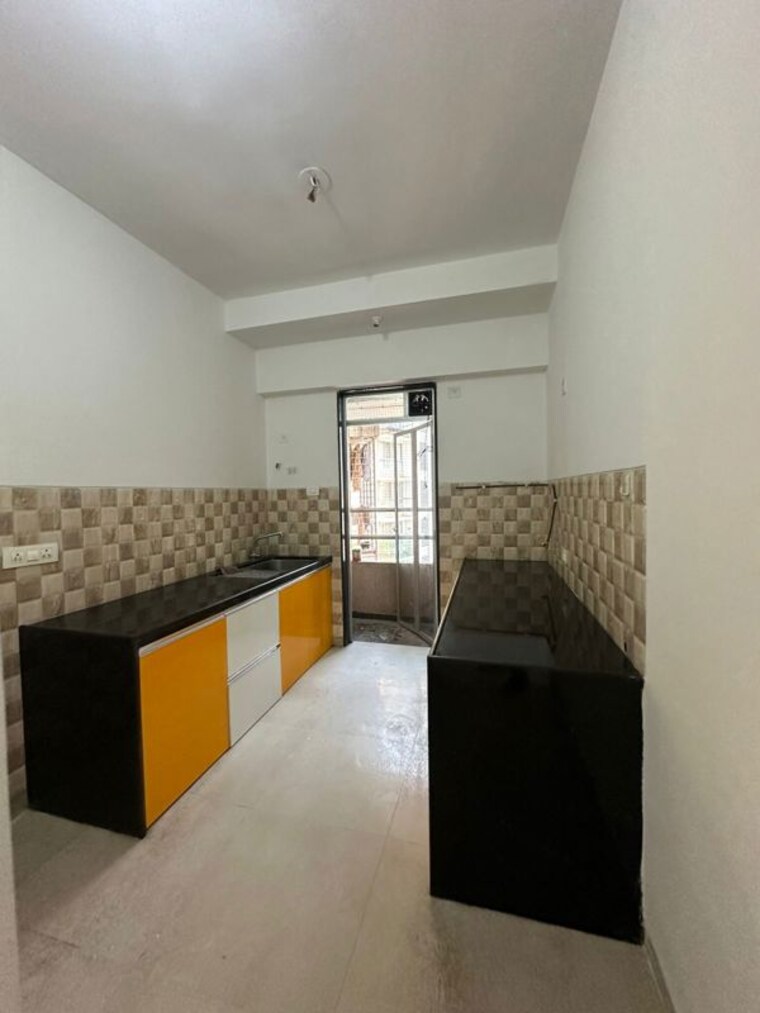 Kitchen, divine-aspen-garden 3 Bedroom 1121 Sq.Ft. Apartment In Goregaon East Mumbai 10565301