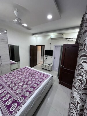 Bedroom in 2 BHK Builder Floor at Nehru Enclave – for Rent