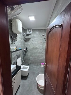 Bathroom in 2 BHK Builder Floor at Nehru Enclave – for Rent