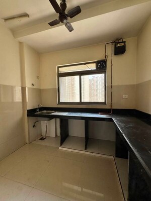 Kitchen in 1 BHK Apartment at Lodha Splendora, Ghodbunder Road – for Sale
