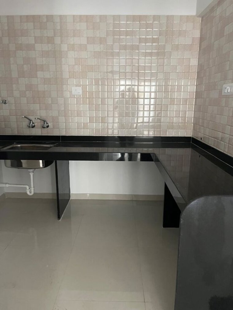 Kitchen, goel-ganga-aurum-park 2 Bedroom 1000 Sq.Ft. Apartment In Tathawade Pune 10565354