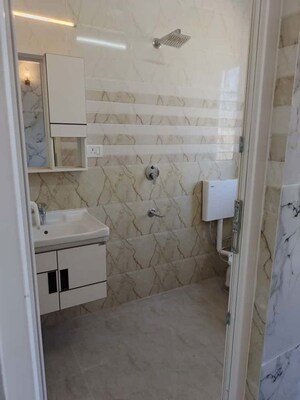 Bathroom in 1 BHK Builder Floor at Kalkaji – for Rent