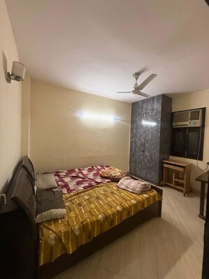 Bedroom in 2 BHK Builder Floor at Kalkaji – for Rent