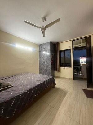 Bedroom in 2 BHK Builder Floor at Kalkaji – for Rent