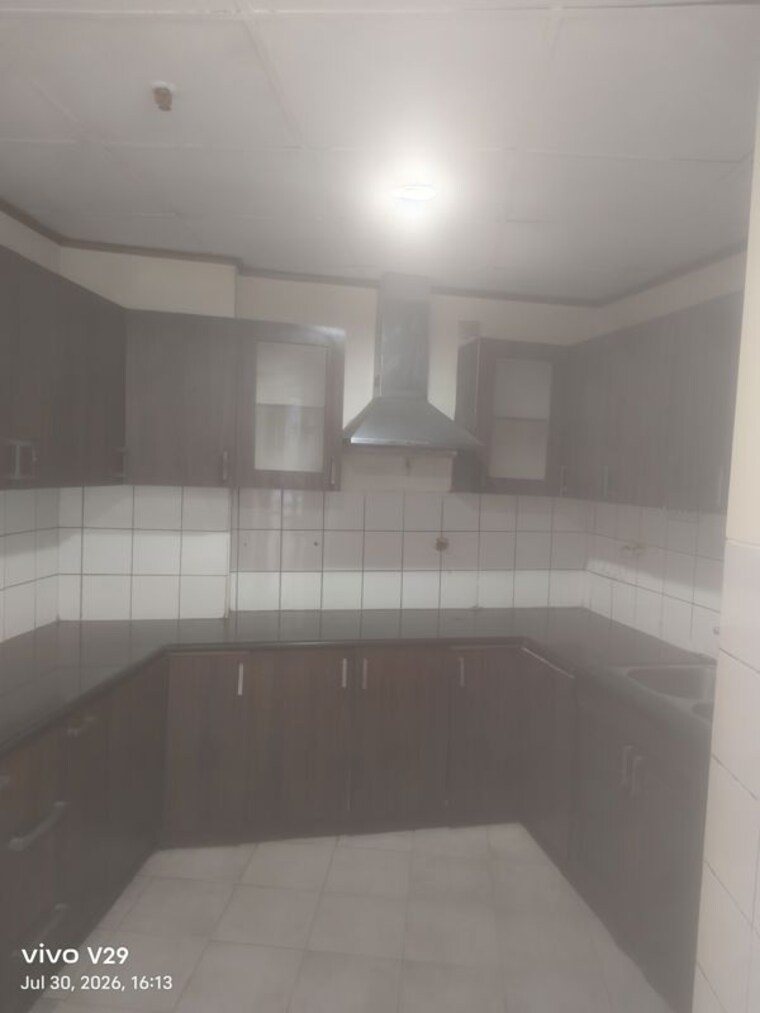 Kitchen, unitech-uniworld-gardens 3 Bedroom 2085 Sq.Ft. Apartment In Sector 47 Gurgaon 10565391