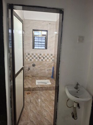 Bathroom in 2 BHK Apartment at Dharti Green, Tathawade – for Rent