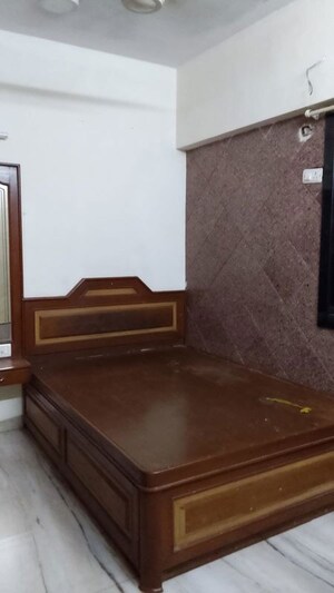 Living Room in 1 BHK Apartment at Raheja Township, Malad East – for Rent