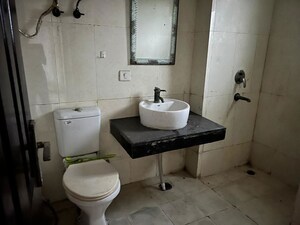 Bathroom in 3.5 BHK Apartment at Paramount Floraville, Sector 137 – for Rent