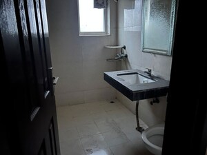 Bathroom in 3.5 BHK Apartment at Paramount Floraville, Sector 137 – for Rent