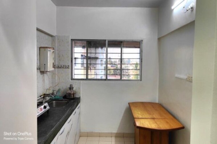 Kitchen, sai-nandanvan-chsl 2 Bedroom 750 Sq.Ft. Apartment In Wadgaon Sheri Pune 10565430
