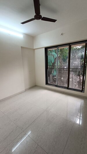 Bedroom in 2 BHK Apartment at Pratham ARC Aura, Andheri West – for Rent