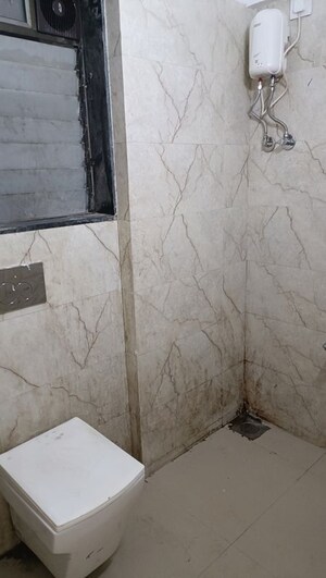 Bathroom in 2 BHK Apartment at Pratham ARC Aura, Andheri West – for Rent