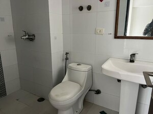 Bathroom in 3 BHK Apartment at Gulshan Vivante, Sector 137 – for Rent