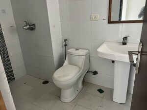 Bathroom in 3 BHK Apartment at Gulshan Vivante, Sector 137 – for Rent