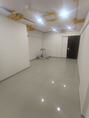 Living Room in 2 BHK Apartment at Amra Kunj, Andheri West – for Rent