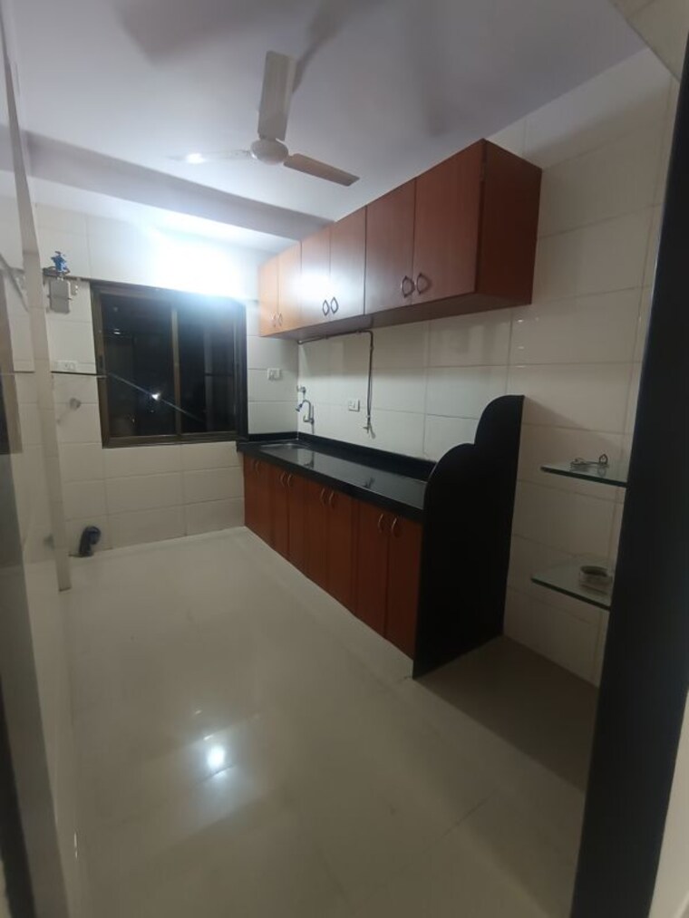 Kitchen, amra-kunj 2 Bedroom 675 Sq.Ft. Apartment In Andheri West Mumbai 10565472