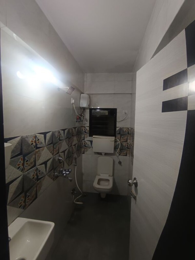 Attached Bathroom, amra-kunj 2 Bedroom 675 Sq.Ft. Apartment In Andheri West Mumbai 10565472
