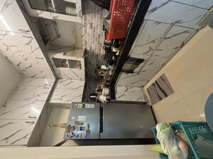 Kitchen in 2 BHK Apartment at Nilaya Greens, Raj Nagar Extension – for Sale