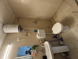 Bathroom in 2 BHK Apartment at Nilaya Greens, Raj Nagar Extension – for Sale