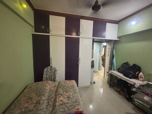 Room in 2 BHK Apartment at Seawoods – for Sale
