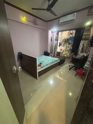 Room in 2 BHK Apartment at Seawoods – for Sale