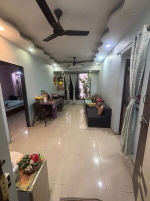 Living Room in 2 BHK Apartment at Seawoods – for Sale