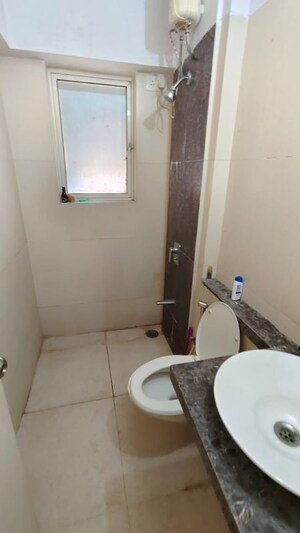 Bathroom in 1 BHK Apartment at Fine Aura, Andheri East – for Rent