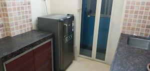 Kitchen in 1 BHK Apartment at Fine Aura, Andheri East – for Rent