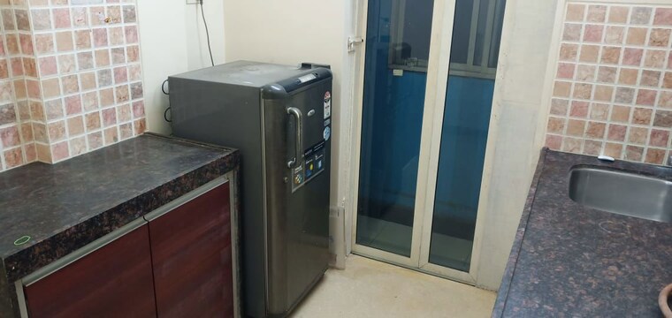 Kitchen, fine-aura 1 Bedroom 500 Sq.Ft. Apartment In Andheri East Mumbai 10565602