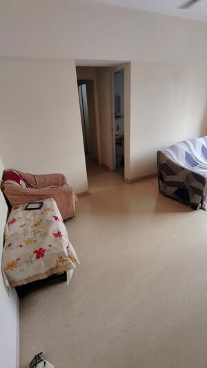 Living Room in 1 BHK Apartment at Fine Aura, Andheri East – for Rent