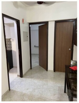 Building Lobby in 1 BHK Apartment at Lodha Amara, Kolshet Road – for Rent