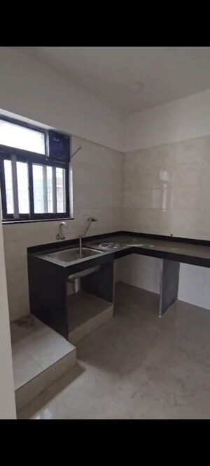 Kitchen in 2 BHK Apartment at Rama Metro Life, Tathawade – for Sale