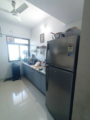 Kitchen in 2 BHK Apartment at Kalpataru Paramount, Kapur Bawdi – for Rent