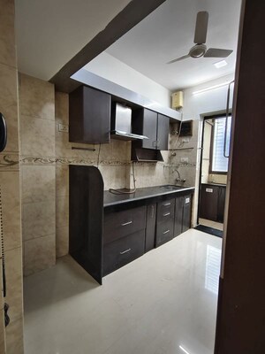 Kitchen in 2 BHK Apartment at K Raheja Heights, Malad East – for Rent