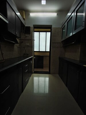Kitchen in 2 BHK Apartment at K Raheja Heights, Malad East – for Rent
