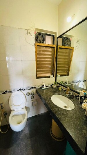 Washroom in 1 BHK Apartment at K Raheja Heights, Malad East – for Rent