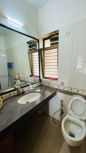 Bathroom in 1 BHK Apartment at K Raheja Heights, Malad East – for Rent