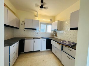 Kitchen in 3 BHK Apartment at Ansal Crown Heights, Sector 80 – for Rent